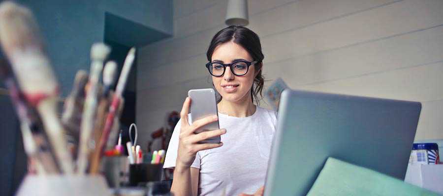 A woman viewing a mobile screen.