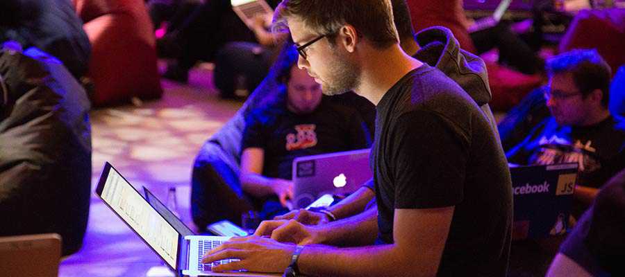 A group of people using computers.